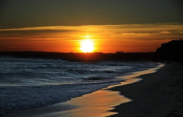 Por do sol na Praia da Falésia em Albufeira Por do sol na Praia da Falésia em Albufeira